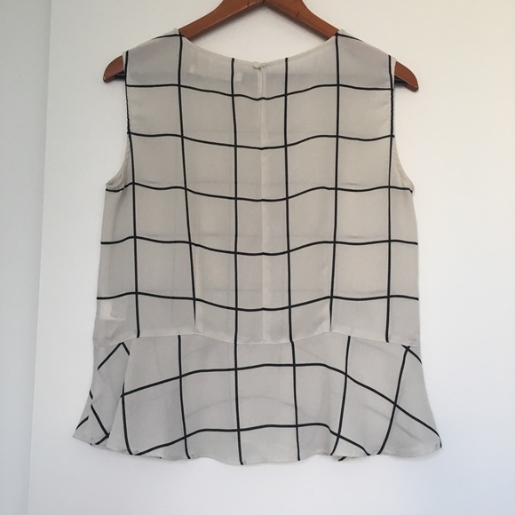 Black and white grid peplum sleeveless top - Picture 2 of 3